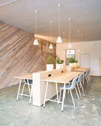 Collective Workspace In Melbourne Features Plank Covered Walls And Bespoke Furniture Modern Office Space Office Space Design Modern Office Space Design