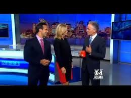 Meteorologist Barry Burbank Holds Coffee Cup Upside Down