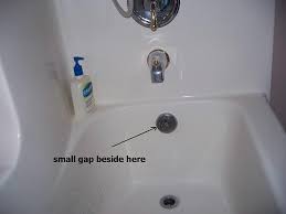 Behind the overflow plate, you can access the tub drain through the overflow tube. Bathtub Overflow Plate Gasket Is This A Problem Terry Love Plumbing Advice Remodel Diy Professional Forum