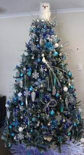 Red decorations really stand out on a tree that has been flocked white. 62 Silver And Blue Decor Ideas For Christmas And New Year Digsdigs