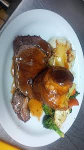 The prime rib is roasted to golden brown perfection and comes out my husband so misses eating prime rib at his favorite restaurant. Prime Rib Dinner Served With Homemade Yorkshire Pudding Grilled Veg And Mashed Potatoes Picture Of In This Corner Bar Grill Schomberg Tripadvisor