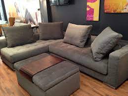 These Two One Armed Sofas Are Linked To Make A Corner Sofa And May Unlink To Pull Together As A Temporary Sofa Bed Sofa Living Dining Room Storage Footstool