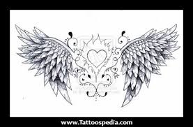 The angel chest tattoo on the right features archangel michael standing over a defeated lucifer, while the back tattoo on the right shows archangel michael with angels a portrait of a woman with her chin on her hand and angel wings peaking behind her head is rendered on the wearer's right shoulder. Angel Wings Tattoo On Chest For Girls