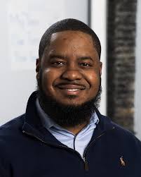 Michael Partis, Executive Director of the Bronx Cooperative Development  Initiative (BCDI) appears