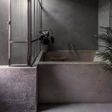 Look through poured concrete bathtub photos in different colors and styles and when you find some poured concrete monolithically poured concrete sink with integrated custom faucet handles. Tranquil Bathrooms With Dark And Soothing Interiors