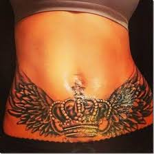 The pregnant woman belly with henna tattoo. Female Tummy Tattoos For Women Female Tattoos Tummy Women The Belly Of A Woman Is Probabl Stomach Tattoos Women Lower Stomach Tattoos Belly Tattoos