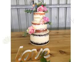 Offering a range of handcrafted, delectable cakes. Cake Decorated With Artificial Flowers And Succulents Cake Topper Perth Wa Australia Artistic Greenery