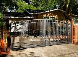 Wrought iron driveway gates with red brick columns. Aluminum Driveway Gates Double Swing Greatfence Com