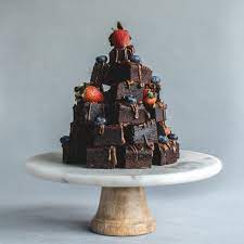 Birthday brownie stack with salted caramel and milk chocolate ganache. Stacked Brownies Birthday Cake Brownies Brownie Cake Cake