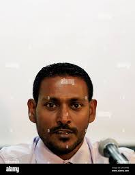 Maldives Vice President Ahmed Adeeb's lawyer Hussain Shameem speaks to the  press in Male, Maldives, Saturday, Oc. 24, 2015. Adeeb will be charged with  high treason after being arrested Saturday at the