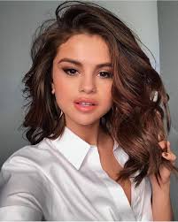 Nowadays, it's swinging from a freshly shaved bottom. Selena Gomez S Hair Evolution See It Through The Years Glamour