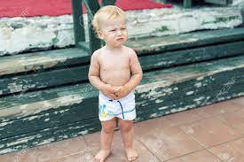 Give him a style that will open his way to. Cute Funny Upset Caucasian 2 Year Old Toddler Boy Standing Abandoned Stock Photo Picture And Royalty Free Image Image 139986714