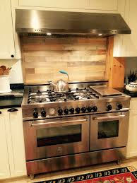Timberchic Sticks To The Old Tile Backsplash Behind This Stove Kitchen Design Stove Backsplash Tin Backsplash Kitchen