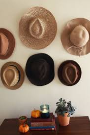 Try This Hats In Place Of Art A Beautiful Mess Simple Wall Decor Decor Hanging Hats