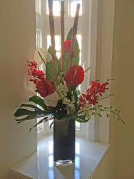 64vr Red Anthurium Red White Dendrobium Orchid Bamboo Foliage Red Flower Arrangements Anthurium Arrangement Anthurium Bouquet