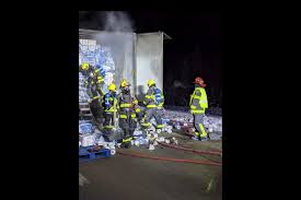 As crowds gathered, drawn in by the rising pall of smoke, emergency personnel tried to control the damage. Canmore Fire Rescue Responds To Semi Truck Full Of Toilet Paper On Fire Cochranetoday Ca