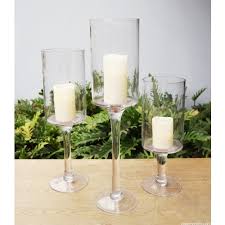 Set of two (2) pillar candle holders, one large and one small. H 24 D 6 Glass Hurricane Stemmed Footed Pillar Candle Holder Cys Excel Usa S 1 Wholesale Supplier