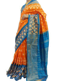 Pairing a punchy orange with a cool blue shade creates a perfectly balanced and stylish look. Orange With Sky Blue Combination Ikat Saree And Blouse