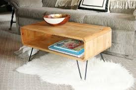 Last, you will measure and cut your 1x2 stretchers to length to fit your coffee table. Remodelaholic Thrifted Cubbies To Mid Century Modern Coffee Table