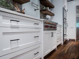 White Shaker Style Cabinetry With Oil Rubbed Bronze Drawer Pulls Rustic Kitchen Cabinets Shaker Style Cabinetry Shaker Style Cabinets