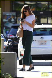@dakotajohnson chats on her phone while stepping out for a salon appointment on tuesday. Dakota Johnson Keeps It Casual For Trip To Earthbar In Weho Dakota Johnson Street Style Celebrity Style Casual Dakota Johnson Style