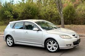 Image result for Sparkling Black 2007 Mazda3