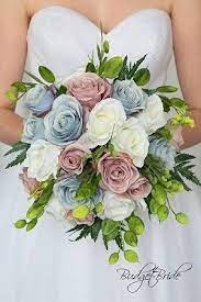 Wild autumn wedding bouquets are all about a fabulous use of fall foliage, don't you know. Dusty Pink And Steel Blue Wedding Bouquet With Lots Of Greenery With Silver Dollar Eucalyptus Dusty Pink Weddings Blue Wedding Bouquet Blue Wedding Flowers
