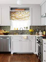 Make A Small Kitchen Look Larger With These Clever Design Tricks In 2021 Kitchen Remodel Small Kitchen Layout Kitchen Design
