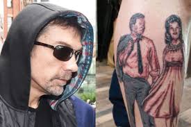 Former union official Derrick Belan used official credit card for tattoo,  dating services, but denies fraud