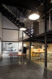 Uk home office lighting guide will help you properly light your workspace from both a functional & an aesthetic standpoint. Old Warehouses Make Stunning Office Spaces Industrial House Office Interior Design House Design
