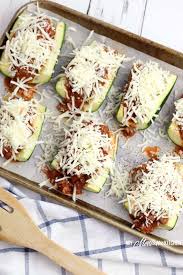 Score zucchini (like you're dicing an avocado) and scoop out insides into a large bowl. Low Carb Pizza Stuffed Zucchini Boats Recipe Keto Thm S