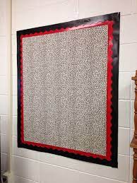 Created A Brand New Bulletin Board On A Bare Wall With Cheetah Print Fabric Taped To The W Bulletin Boards Classroom Decor Red Classroom Decor Classroom Walls