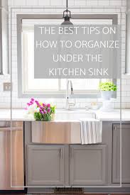 to organize under the kitchen sink