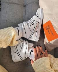 The upper is composed of a white leather base and features detailing in the form of a perforated toe, embossed tonal wings logo on the collar and on the. Jordan 1 Mid Iridescent Reflective White W In 2020 Sneakers Fashion Nike Shoes Jordans Jordan Shoes Girls
