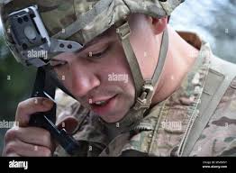 U.S. Army Staff Sgt. Richard Wallace with Company C, 1st Battalion, 68th  Armor Regiment, 3rd Armored Brigade Combat Team, 4th Infantry Division,  talks