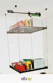 Four bluetooth motors utilize our existing overhead platform to raise and lower your items with a touch of a screen on your smartphone. Pin By Sherry Seidl On Storage Garage Storage Racks Garage Storage Overhead Garage Storage