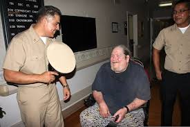 U.S. Navy Chief Petty Officer Miguel Alderete, left, with Navy Operational  Support Center (NOSC) Ventura County, and Hospital Corpsman 3rd Class Chris  Sunga, right, with the Navy Reserve Operational Health 121207-N-OM503-048 -