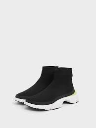 Runs a half size large. 4ward Collection Black Knitted High Top Slip On Sneakers Charles Keith De