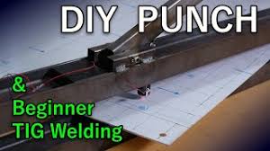 The holes you punch have a little slot that goes all the way to the edge of the page. Diy Punch Tool Youtube