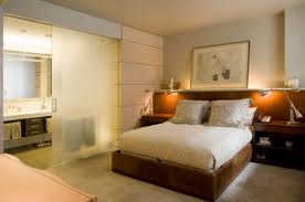 There is a large opening at the top of the wall between the master bathroom and bedroom. Bedroom And Bathroom 2 In 1 Suites Clever Combos Or Risky Designs