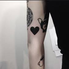 Hours may change under current circumstances A Black Heart Tattoo On The Right Arm Black Heart Tattoos Heart Tattoo Ink Tattoo Shoulder