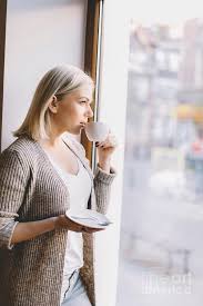New users enjoy 60% off. Young Woman Drinking Coffee Looking Through The Window Photograph By Michal Bednarek