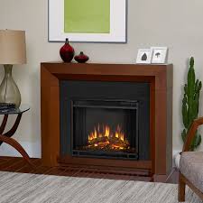 The term has evolved to include the decorative framework around the fireplace, and can include elaborate designs extending to the ceiling. Real Flame Hughes Vintage Black Maple Electric Fireplace 3001e Vbm Real Flame