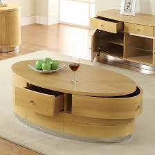A glass coffee table makes for an elegant, subtle addition to the room, while a coffee table with storage is perfect for creating space for a striking centerpiece. Get Hands On This Oval Shaped Beautiful Coffee Table That Offers Not Only Style But Function As Well The Curvy Structure Of Jann Coffee Table Meja Kopi Meja