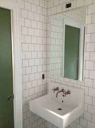 Plain, coloured tiles, either on the floor or on the bathroom walls, will look chic and sophisticated. Blogs Turned Books White Tile Shower Master Bathroom Design Bathroom Addition