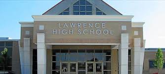 Victim's mom wants Lawrence school district held accountable for racial  strife at homecoming game