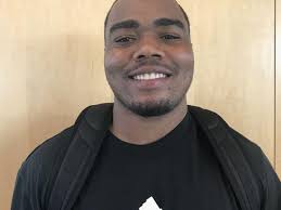 Aarion Hartman embraces long snapper role