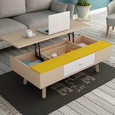 Brown medium round wood coffee table with lift top. Adjustable Height Lift Top Coffee Tables