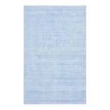 This would go well with light or dark furniture, or even furniture in complementing colors. Milo Contemporary Solid Hand Loomed Area Rug Light Blue 8 X 10 Chairish