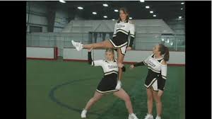Cheer Stunting L Stand To Shoulder Sit Ehow Cheerleading Stunt Cheer Stunts Cheerleading